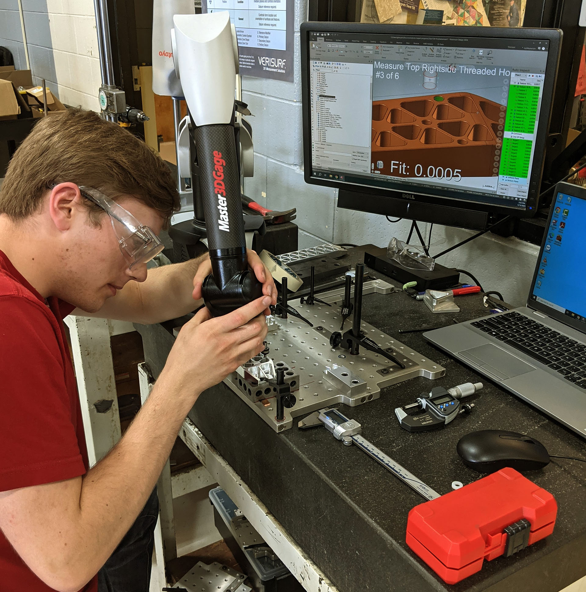 Student Inspecting a machined part with Verisurf and the Master3DGage